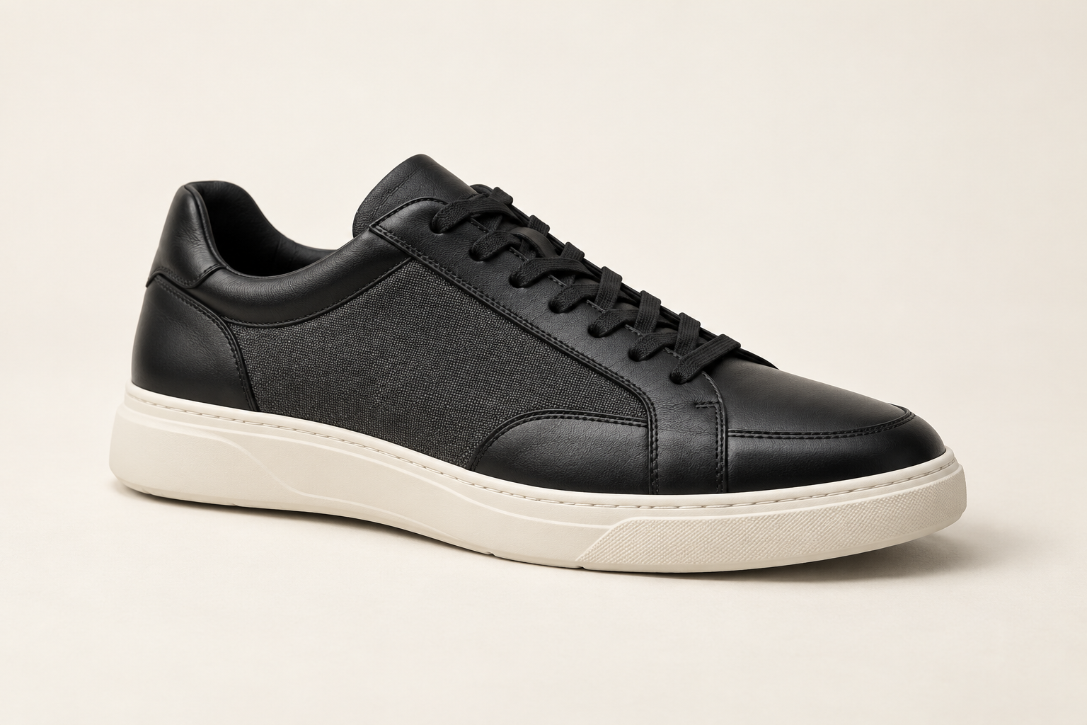 Black Everyday sneaker with an off-white sole